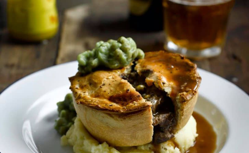 One of the pies on a plate at The Dark Horse pub in St George, East Bristol - credit The Dark Horse