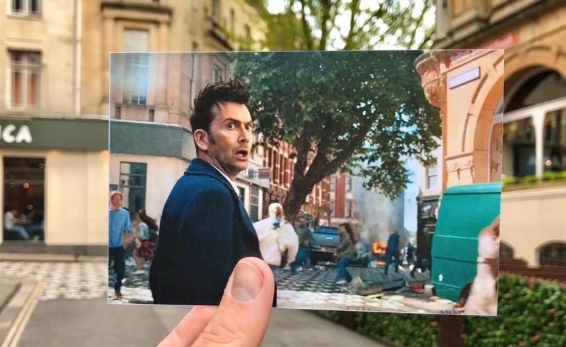 A view of Clare Street in Bristol's Old City, with a hand holding a photograph of actor David Tennant filming one of the 2023 Doctor Who specials in the same spot - credit Logan Walker