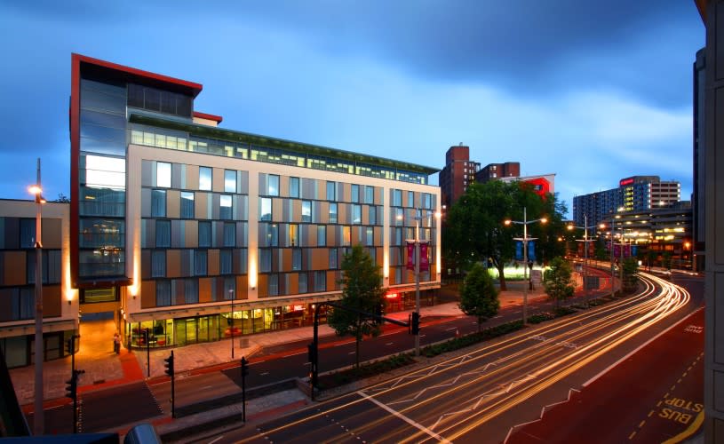 Exterior of Future Inns Bristol Cabot Circus Hotel at night - Credit Mark Ashbee