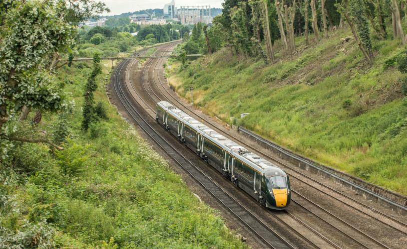 A GWR train travelling at speed on the train track - Credit Great Western Railway