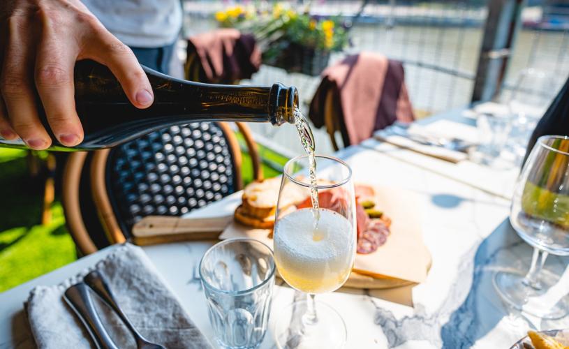 Wine being poured on the terrace at Harbour House in the Redcliffe area of Bristol - credit Harbour House