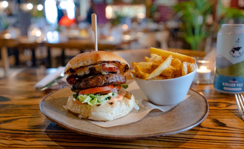 Burger and chips on plate