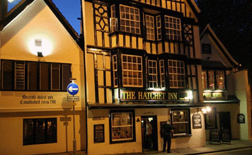 The Hatchet pub exterior at night