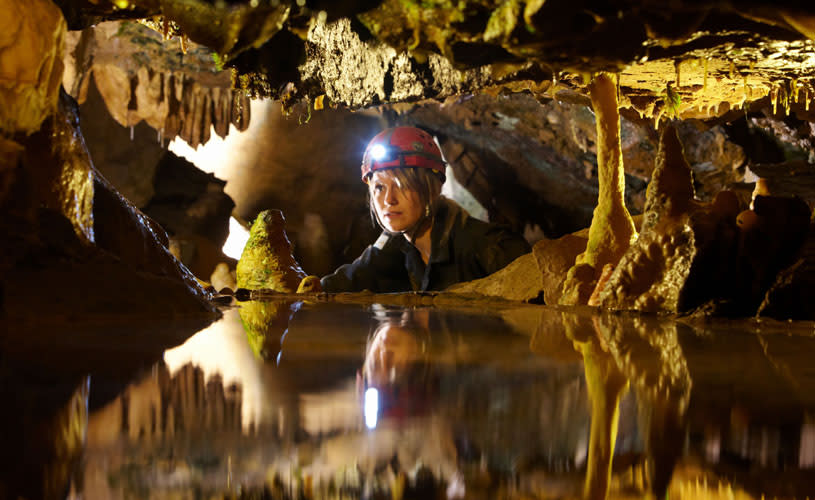 Exploring the interior of the caves at Cheddar Gorge & Caves near Bristol - credit Cheddar Gorge & Caves