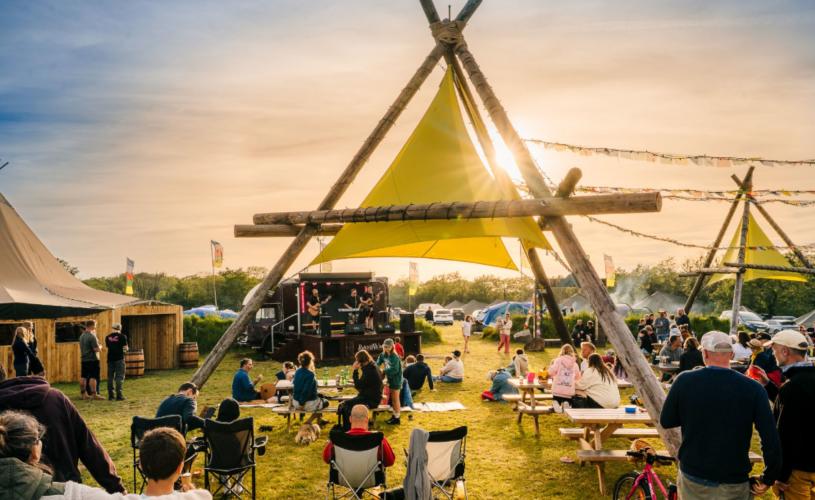 People enjoying sunset at Mendip Basecamp - JA