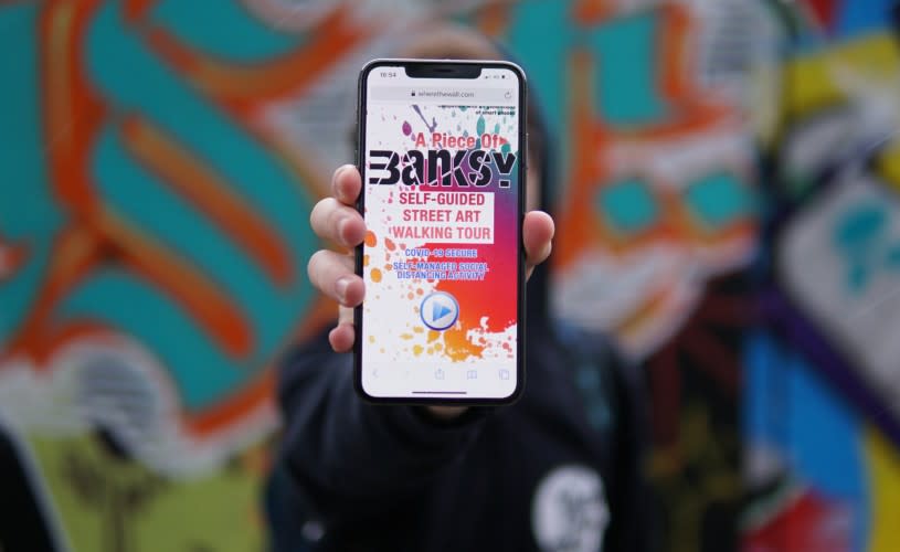 A phone screen showing a self guided Banksy tour - Credit Visit West