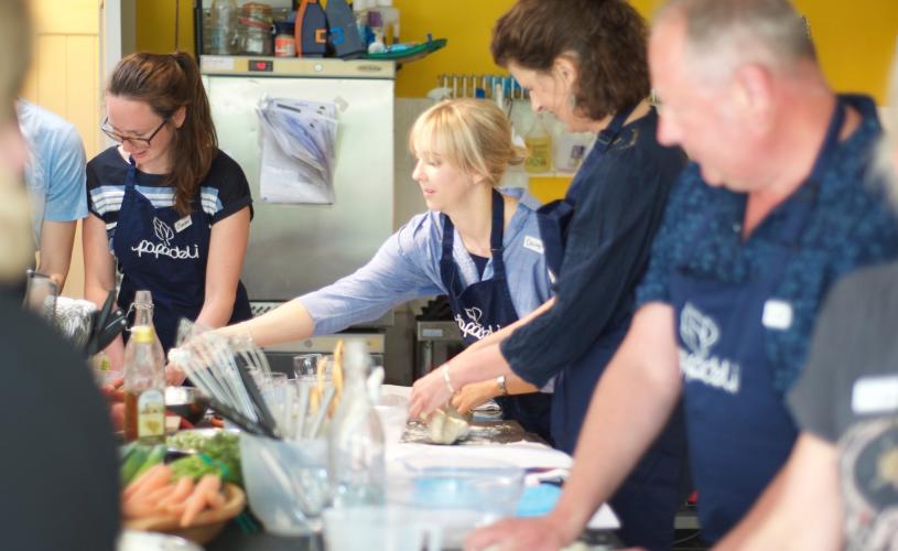 A group of people taking part in a cooking class at Papadeli in Clifton, West Bristol - credit Papadeli