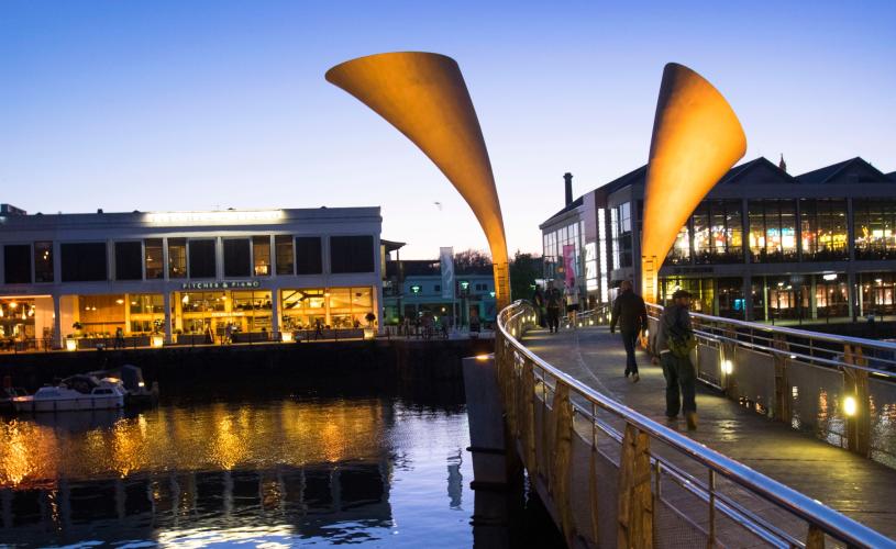 A wide shot of Pero's Bridge on Bristol's Harbourside at night - credit Paul Box