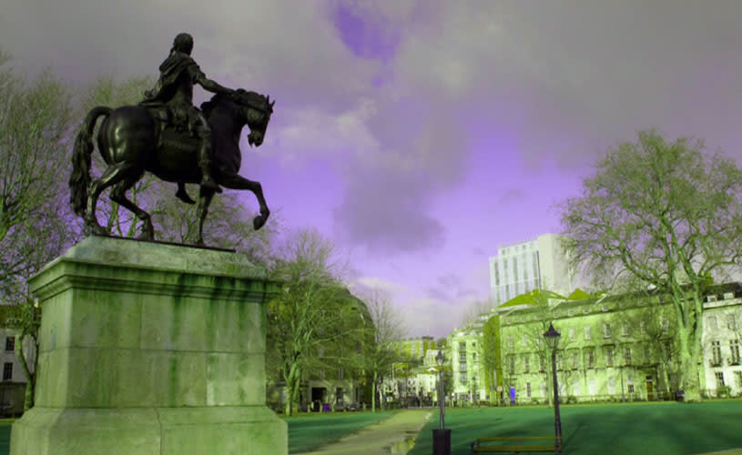 A view of the statue in the centre of Queen Square in central Bristol at night - credit Tamany Baker