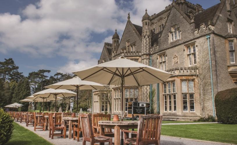 De vere Tortworth Court near Bristol exterior with outdoor bar and seating in garden - credit De vere Tortworth Court