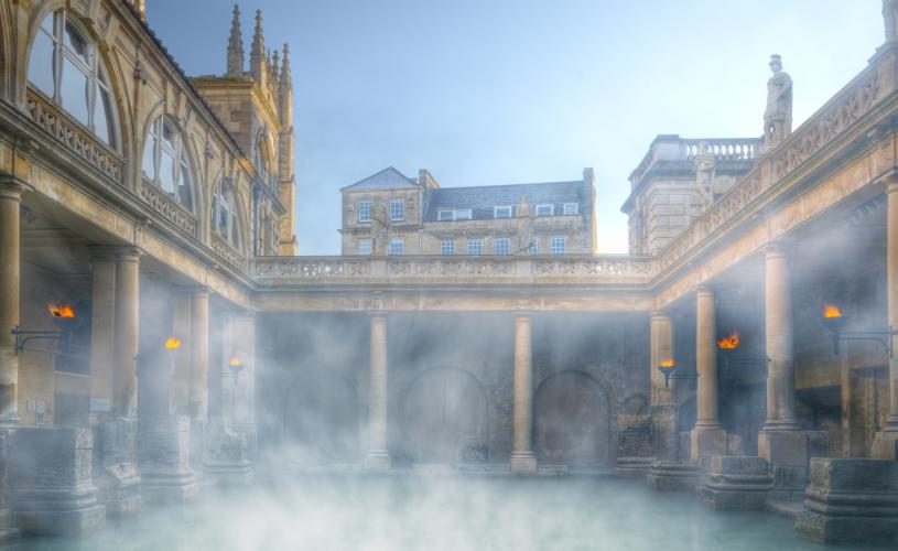 An wide shot of the Great Bath at The Roman Baths in central Bath, near Bristol