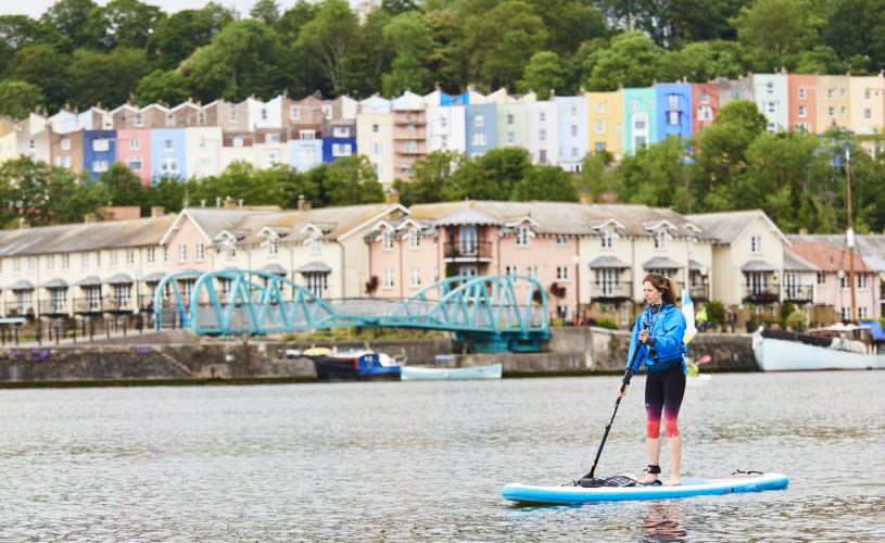 Paddleboarder in front of Hotwells - credit SUP Bristol