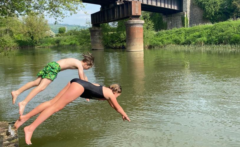 People swimming in the river at Saltford near Bristol - credit Georgie Duckworth