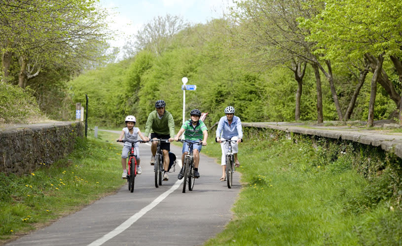 Family cycling along Bristol and Bath Railway Path in Mangotsfield - credit South Gloucestershire Council