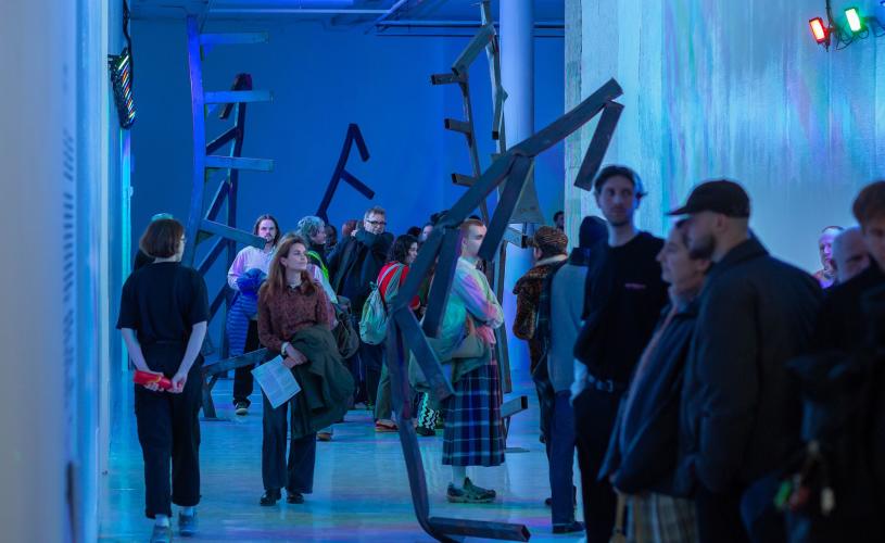 people looking wandering through exhibit at Spike Island