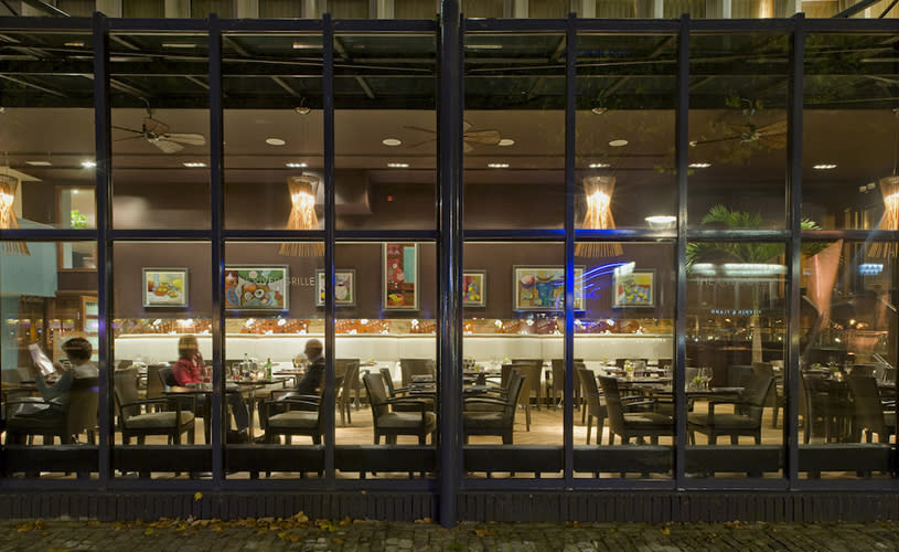 Glass fronted restaurant at night