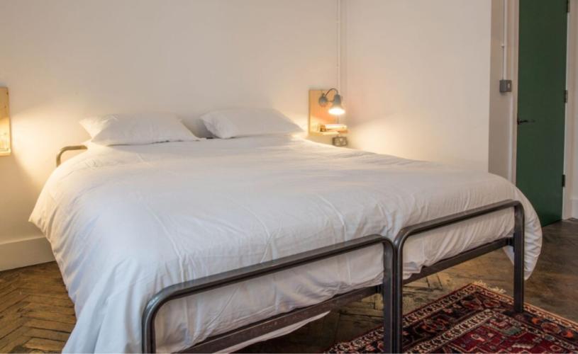 A double bed at The Bristol Wing hostel