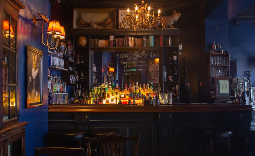 Ornate cocktail bar in low light