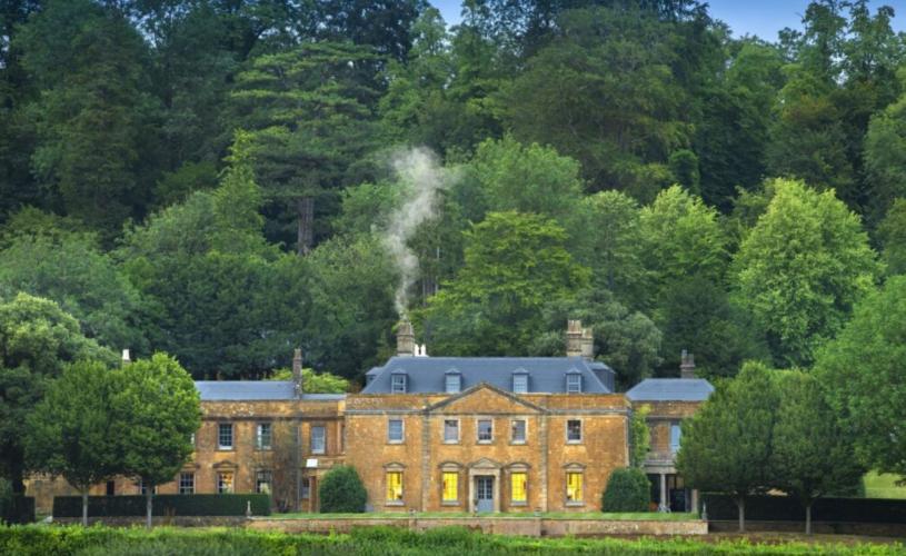 The Newt in Somerset - Hadspen House front with smoke in the chimney