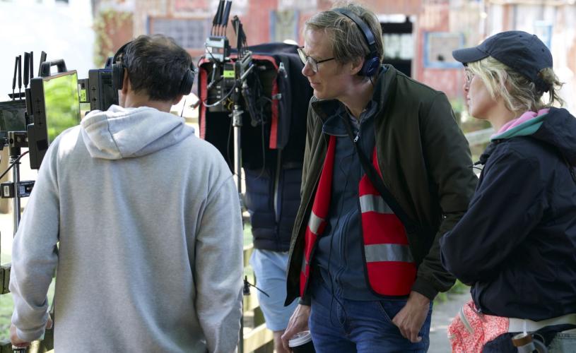 Outlaws Season 3 - Stephen Merchant with camera and crew - credit Big Talk Studios / BBC)