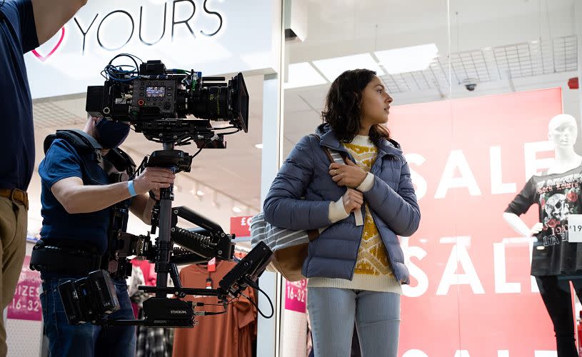 Rhianne Baretto filming season 1 of The Outlaws (2021) at The Galleries Shopping Centre in central Bristol - credit BBC, Amazon Studios, Big Talk, and Four Eyes