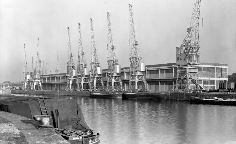 Transit sheds and cranes at Princes Wharf in 1953 - Credit Visit West