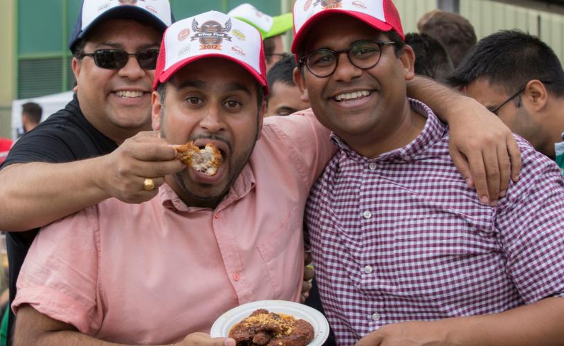 Three means eating chicken wings at Bristol Wing Fest - credit Bristol Wing Fest