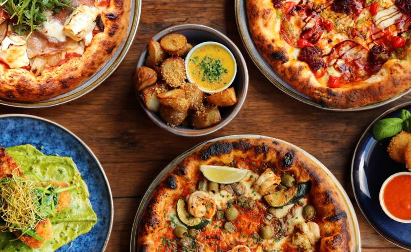 Pizza and side dishes from above - credit Cafe Napolita