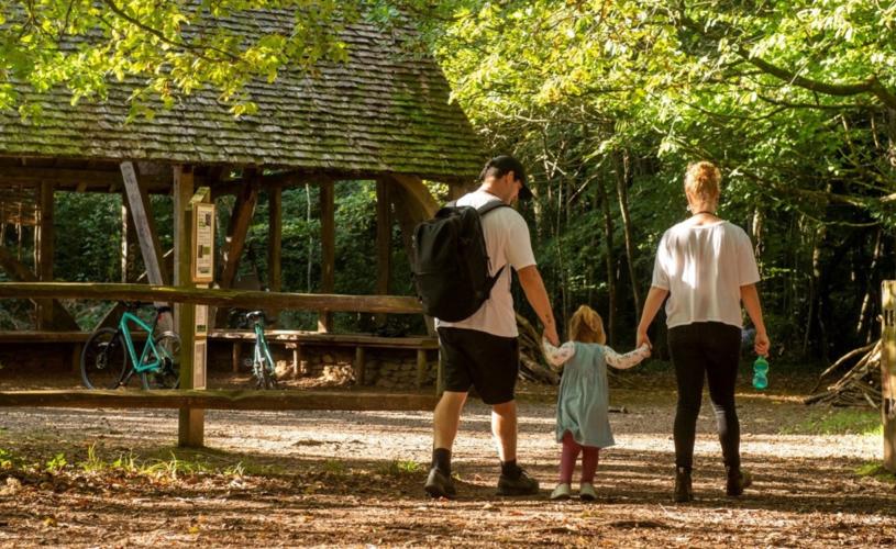 Family walking in Leigh Woods in Bristol - credit Forestry England