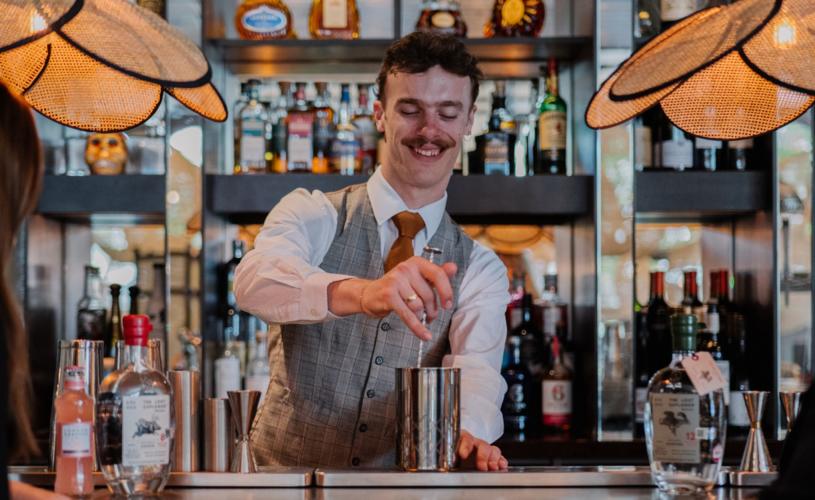 A bartender prepare a cocktail at Rick's Bar on Bristol's Harbourside - credit Rick's