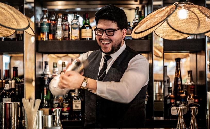 A bartender preparing a cocktail at Rick's Bar on Bristol's Harbourside - credit Rick's