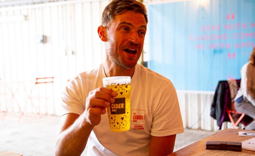 Man drinking a pint of cider at The Cider Box in Bristol - credit The Cider Box