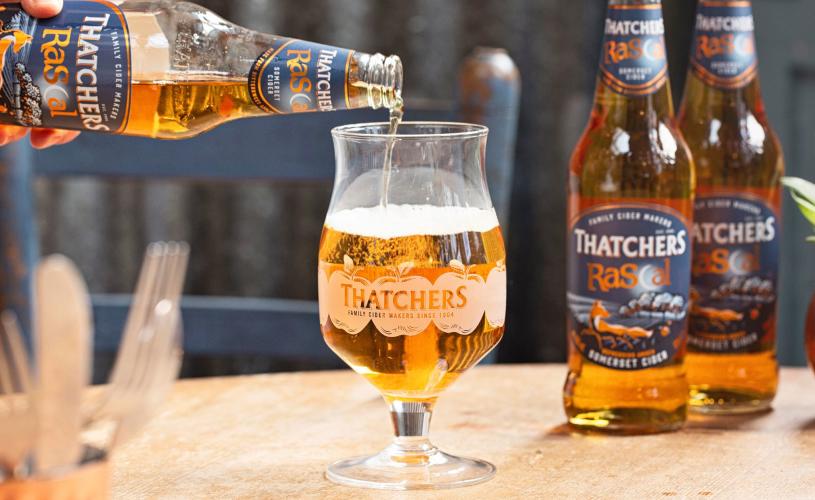 Pouring pint of Rascal cider - credit Thatchers Cider