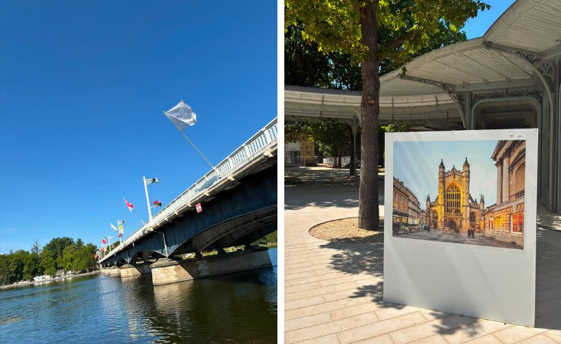 Flags flying off a bridge over a river in Vichy and an exhibition image of Bath Abbey