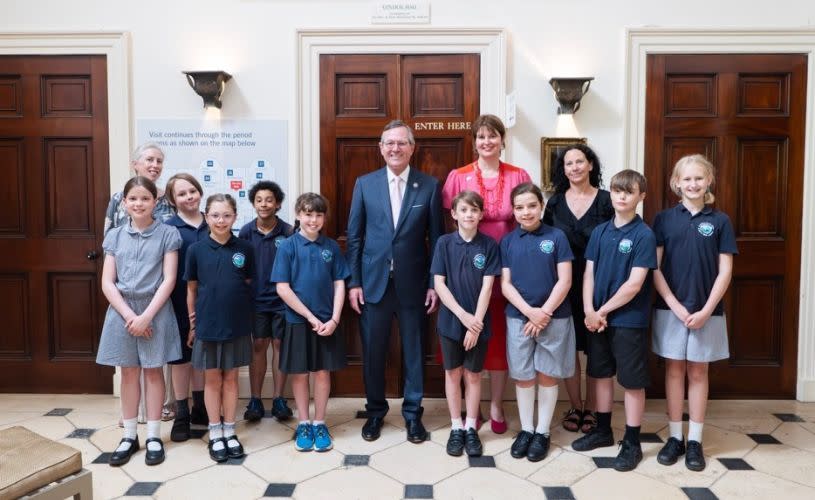 Warren A. Stephens, American Ambassador to the Court of St James, visits American Museum & Gardens, Bath, joined by Lucy Littlewood, Museum Director and students from Freshford Church School