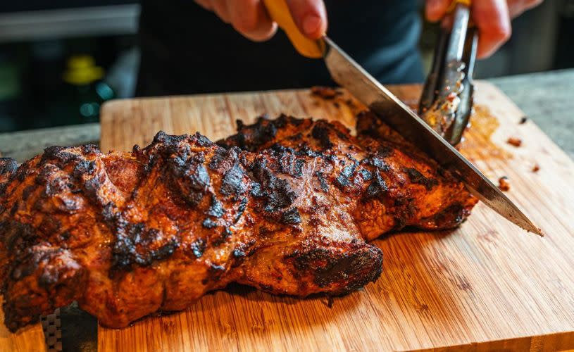 Person carving meat at The Granary - credit The Granary