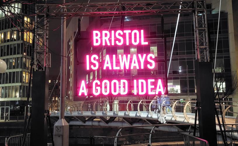 A view of the 'Bristol Is Always A Good Idea' installation on Valentine Bridge in Temple Quay during Bristol Light Festival 2024 - credit Max Rawlinson
