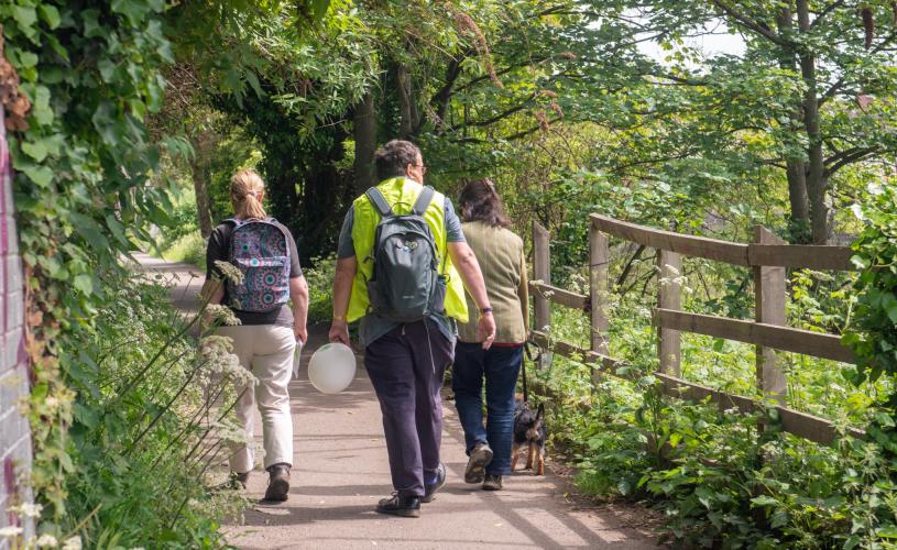 A group of people walking along river path in Brislington, Bristol, as part of Bristol Walkfest - credit Katie Murt