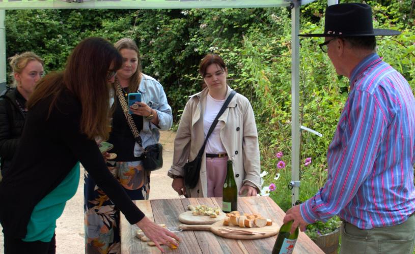 Wild West Cider people enjoying cheese and cider samples credit Hallam Greene