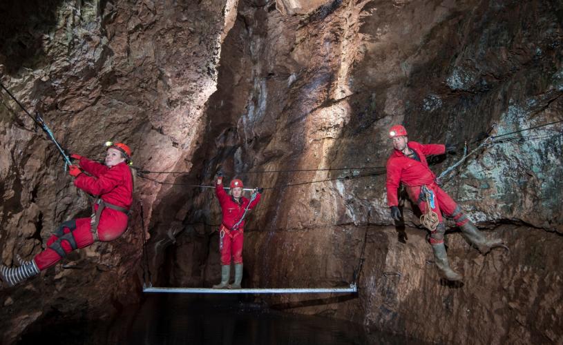 A group participating in the Wild Wookey caving experience at Wookey Hole in Wells, near Bristol - credit Wookey Hole