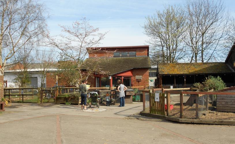 A family exploring the animal enclosures at Windmill Hill City Farm in South Bristol - credit Windmill Hill City Farm