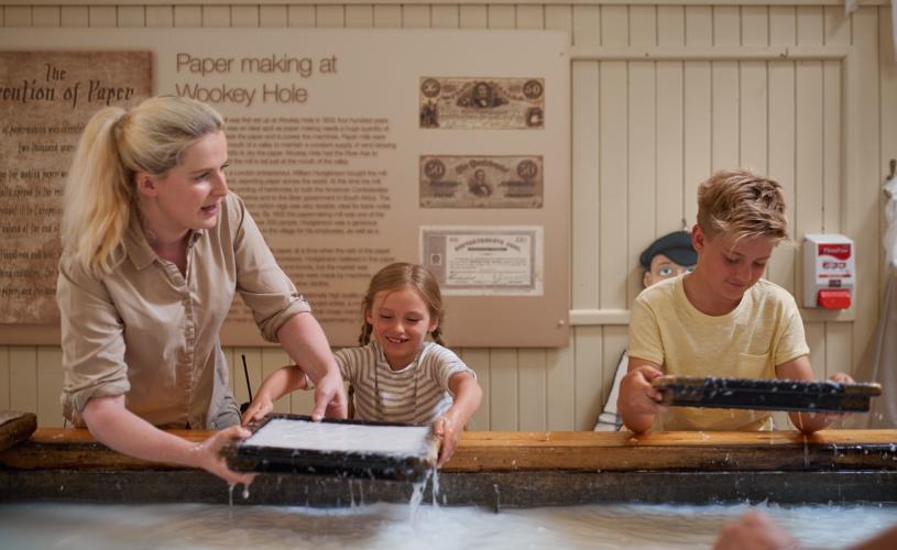 Children making paper at Wookey Hole near Bristol - credit Wookey Hole