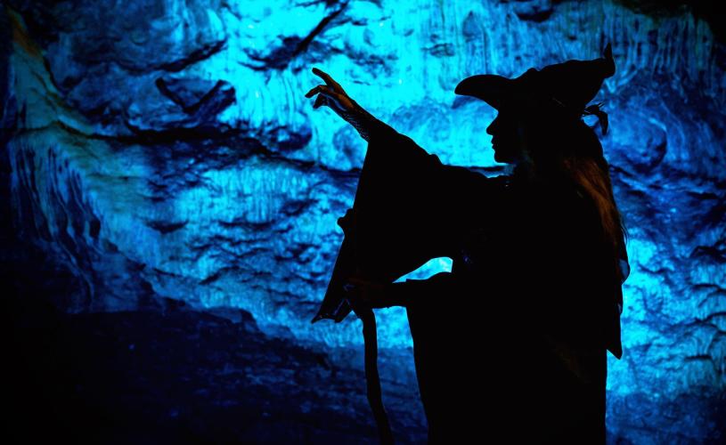 Silhouette of witch in a cave - Credit Wookey Hole