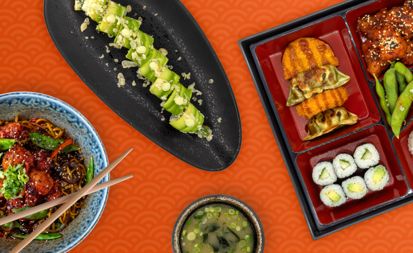 Yakinori vegan dishes: Firecracker cauliflower noodles, Vegan feast Bento with miso soup and Tempura broccoli and avocado sushi roll