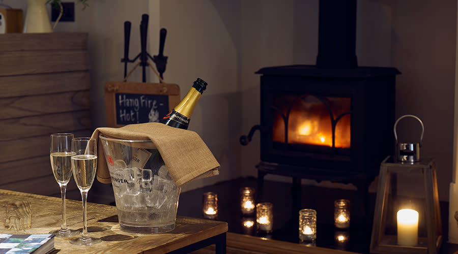 A roaring log fire at The Painswick