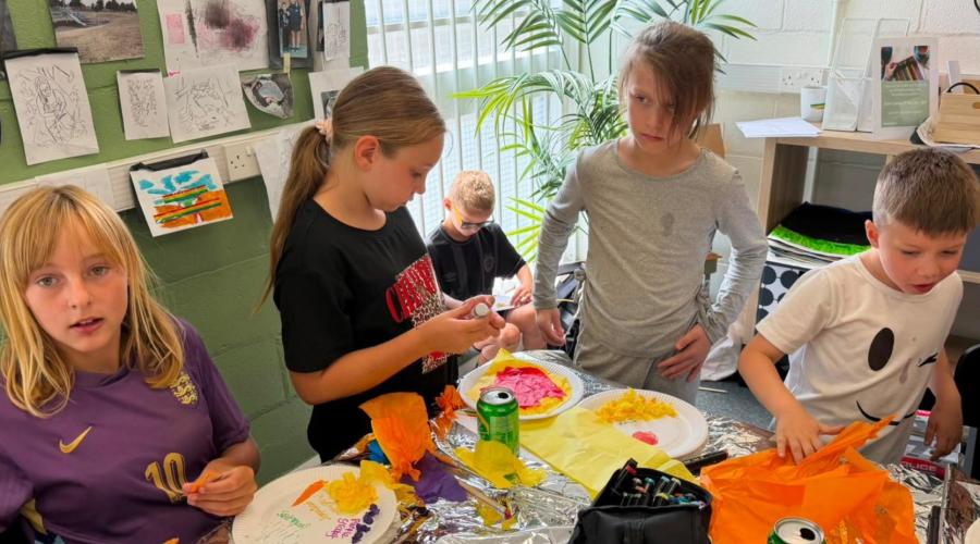 Children doing crafts at reel creative workshop