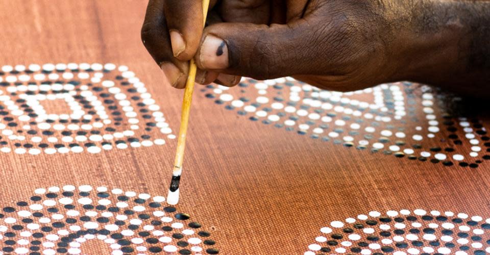 Artist at work in the Norval Gallery, Derby Western Australia