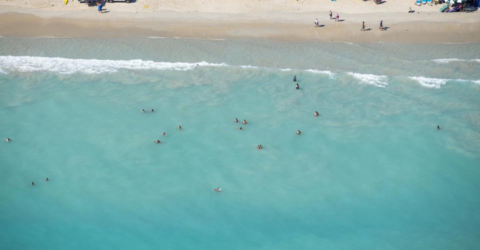 Aerial view of people enjoying Cable Beach Broome.
