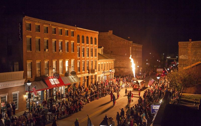 Costumed marchers in the Galena Halloween Parade on Main Street