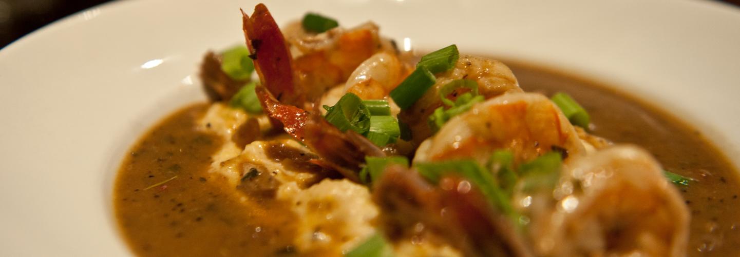 Close-up photo of beautiful shrimp and grits dish